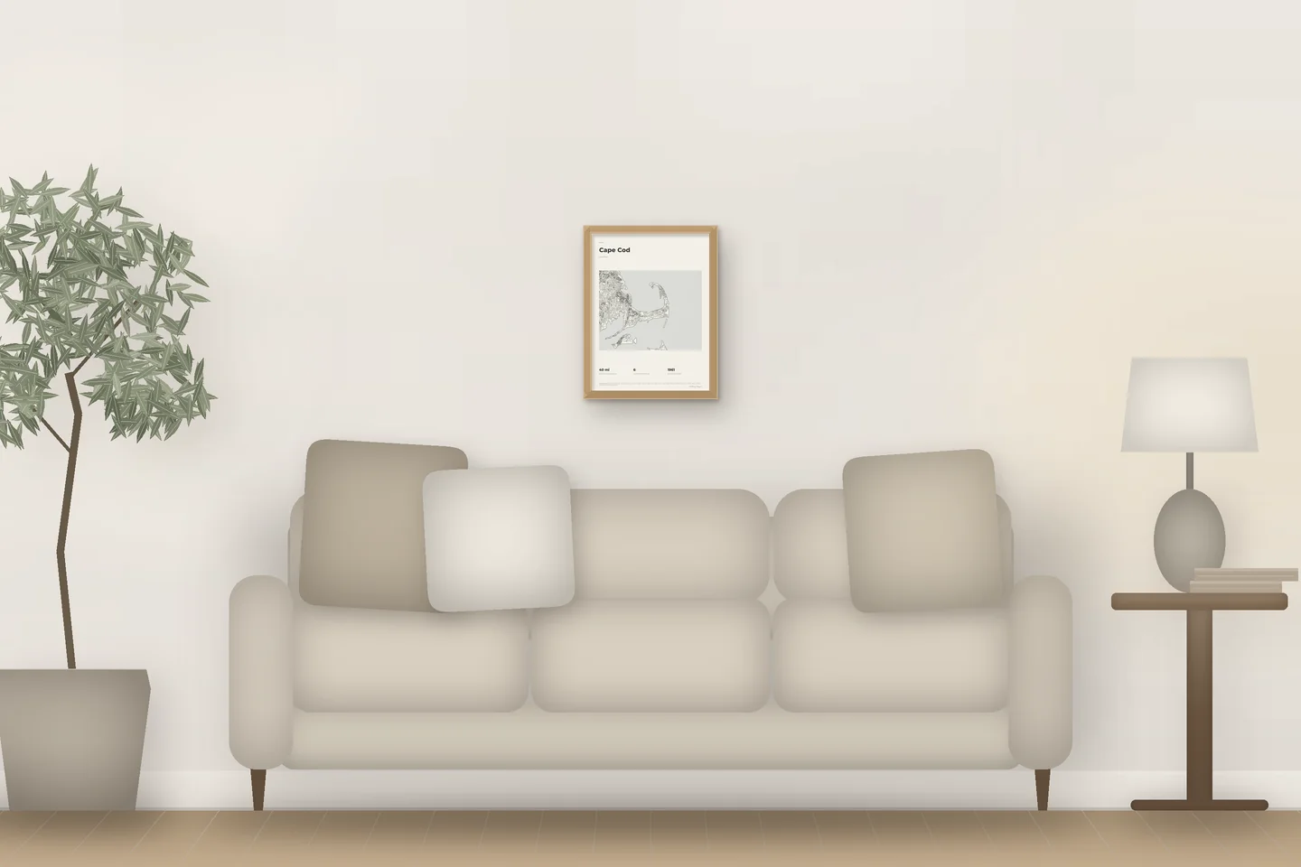 Cape Cod (12 × 16 in · Natural oak · Ivory & Graphite) above a living-room sofa — illustrative digital preview, not a photo